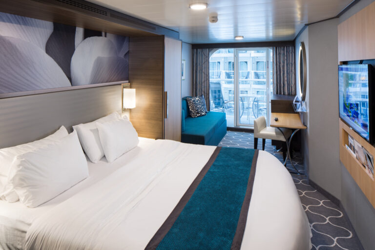 HM, Harmony of the Seas, Boardwalk View Stateroom with Balcony, Cat. B2,  Room #12693, Deck 12 Aft Starboard, bedroom, bed, bedding, decor, flat screen monitor, living room area in background with couch and desk, outside view from balcony in background, boardwalk view,