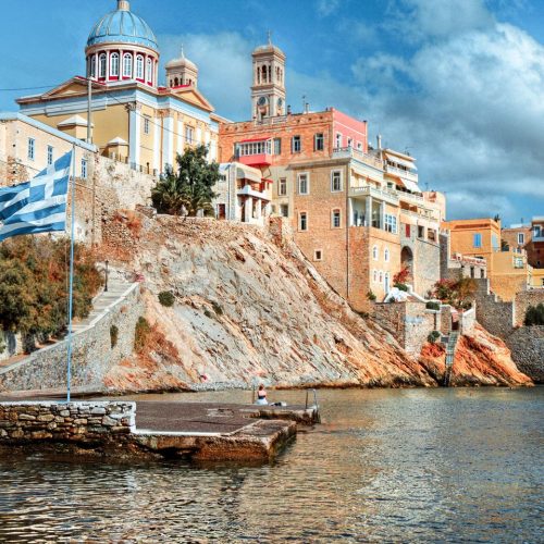 1_view_of_colorful_houses_and_church_on_ermoupolis-1